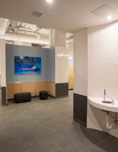 A bathroom with a sink and a mirror.